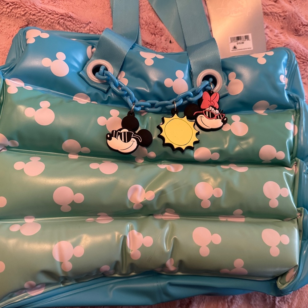 Disney inflatable waterproof  purse. Perfect for the beach or the pool!